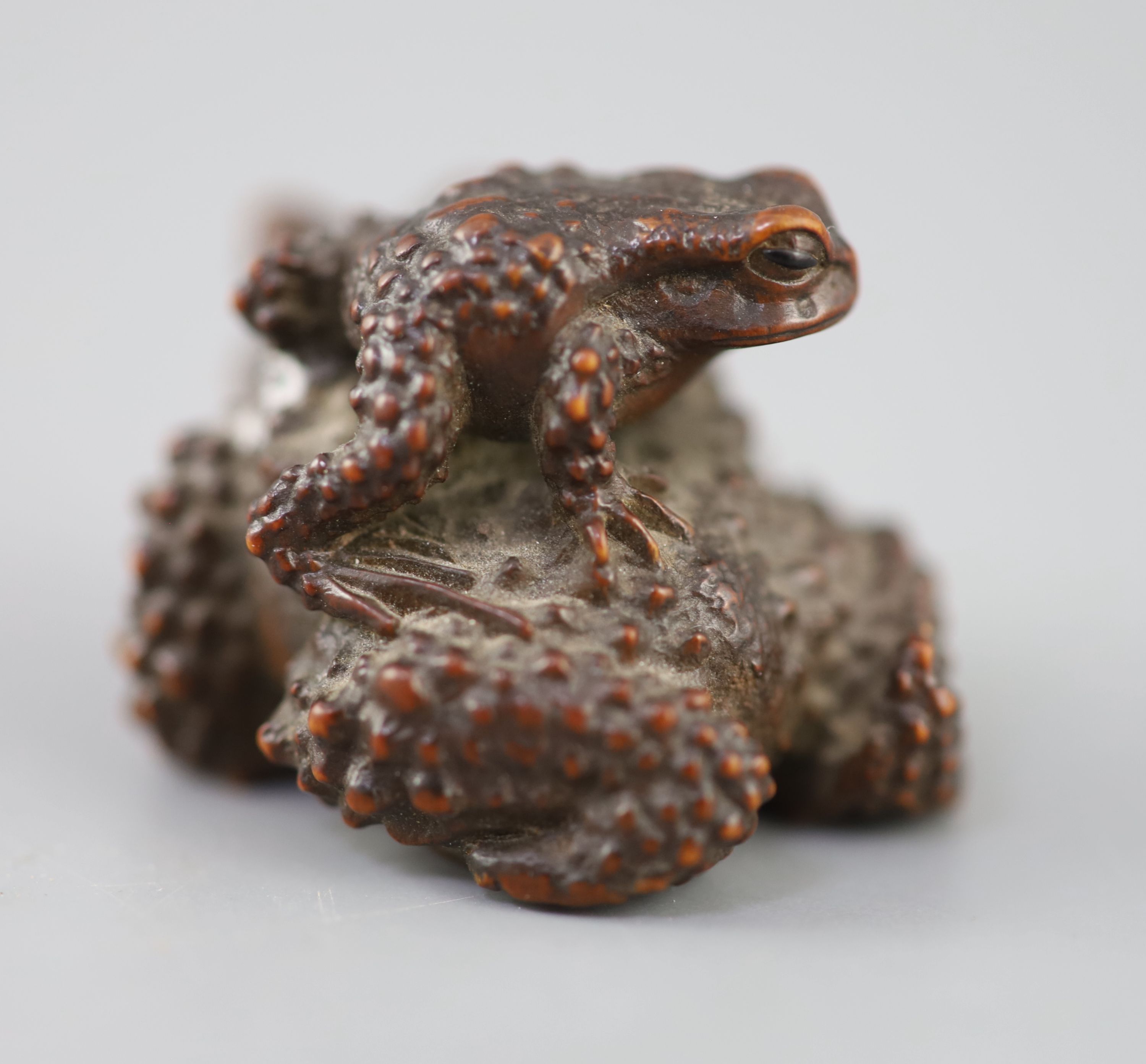 A fine Japanese wood okimono of toads, signed Masanao, 19th century,